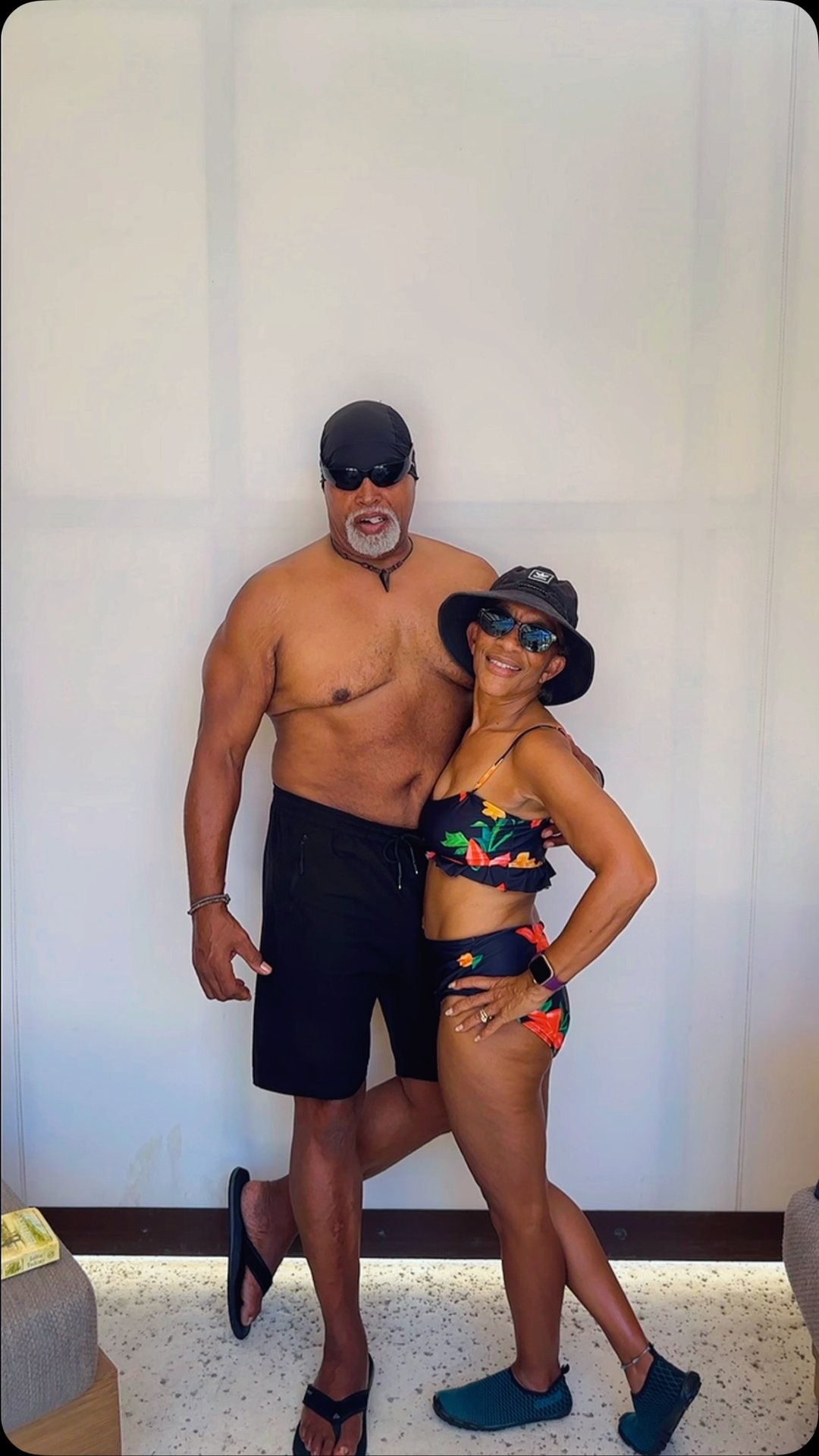 Rafael and Catherine posing together in swimwear